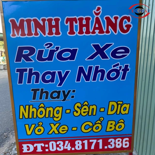 Bảng hiệu tiệm rửa xe máy