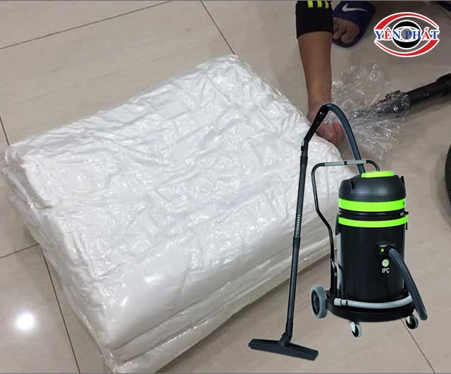 dung máy hút bụi hút chân không