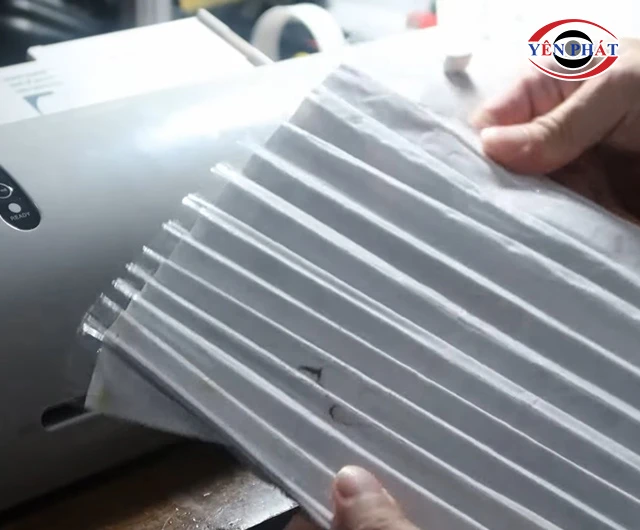 ép giấy bị nhăn