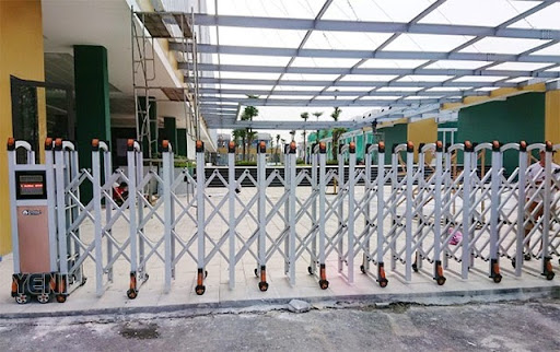 sửa cửa cổng xếp bình dương - Điện Máy Yên Phát